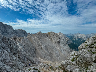 Panoramic view of rugged mountain ridge Lipnica seen from top of summit Spik, wild Julian Alps....