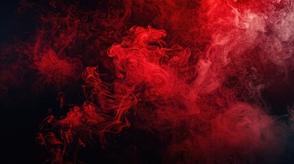 Fototapeta premium Abstract red smoke swirling against a dark background, creating a dramatic visual effect.