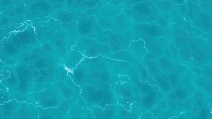 Obraz premium Close-up of pure blue turquoise water with foam and waves in the ocean, water, waves