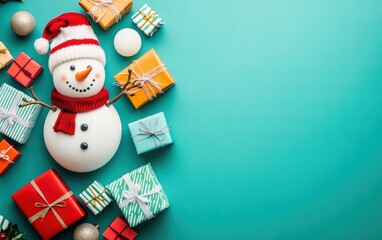Fototapeta premium A snowman surrounded by colorful gift boxes on a teal background