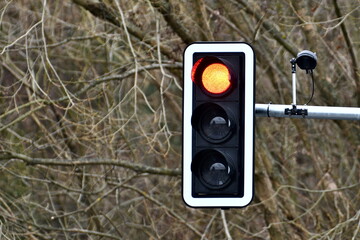 Stop red light on traffic lights. Negative copy space.