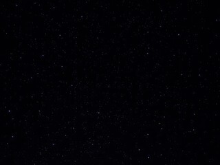Starry night sky with twinkling stars over dark background, celestial, serene