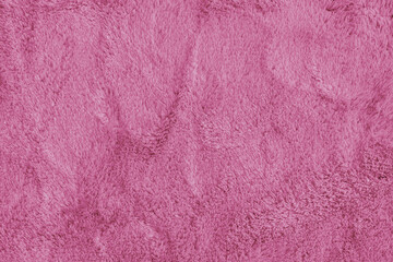 Soft shaggy pink carpet texture. Fluffy synthetic textile fur, plush textile, blanket cloth...
