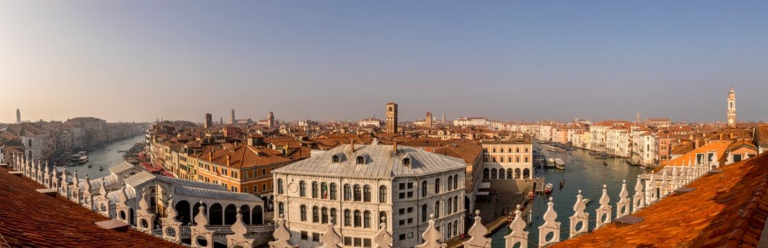 Venice, Italy - February 5, 2024: Architecture of Venice, palaces and beautiful houses along the Grand Canal near Rialto bridge, Italy