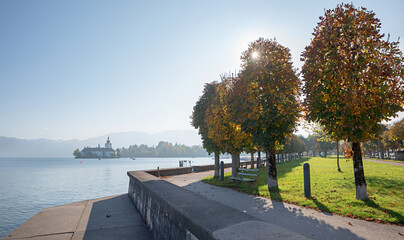 beautiful lakeside Promenade Traunsee, tourist resort Gmunden. chestnut trees and benches.