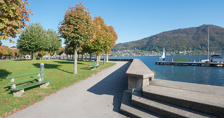  lakeside Promenade Traunsee with benches, tourist resort Gmunden. chestnut trees and benches. © SusaZoom