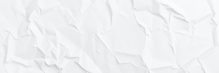 Obraz premium Crumpled white paper with soft shadows on a dark background, wrinkled, white paper, material