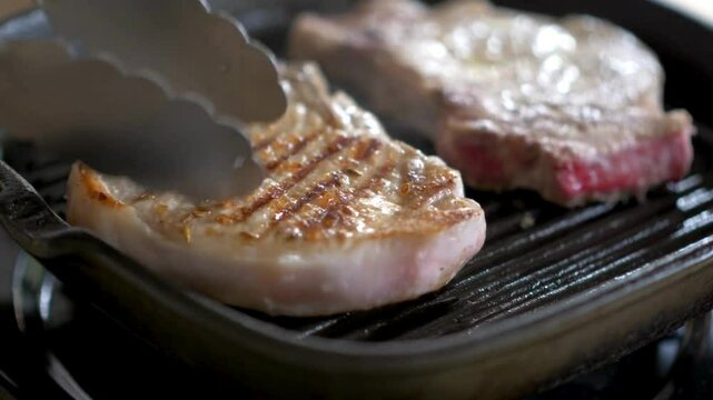 4K Culinary Art: Chef Cooking Pork Chops on a Griddle Pan