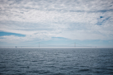 deep blue water and bridge