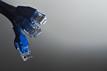 Ethernet cable.. Macro shot of a blue RJ45 Ethernet cable. Internet cable, Patchcord, router cable,...