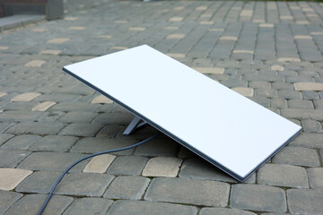 The Installation of a Modern Outdoor Dish Antenna on the Steps Enhances Functionality and Appeal