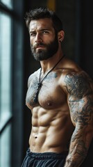 Fototapeta premium Tattooed Fitness Male in Urban Setting