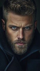 Obraz premium Intense Male Portrait with Striking Blue Eyes