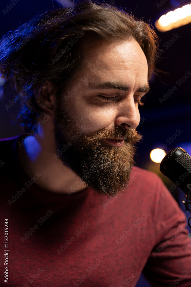 Leinwandbilder songwriter composing new music and singing on microphone, playing piano keyboard and recording song 