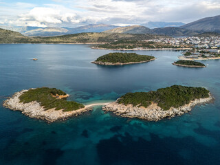 An aerial view of Ksamil Islands surrounded by blue and turquoise waters. Albania
