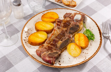 Traditional Spanish Churrasco - grilled veal served with broiled sweet pepper and potato