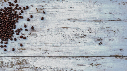 Fototapeta premium Coffee beans scattered on rustic wood.