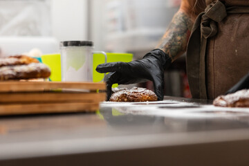 Artisan baker preparing delicious pastries in Italian bakery