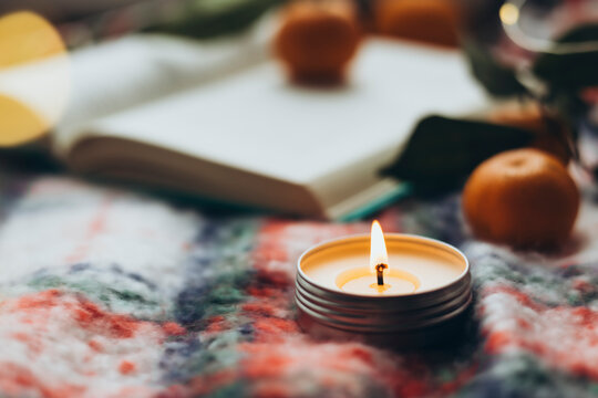 Cozy Christmas scene with candle and festive details