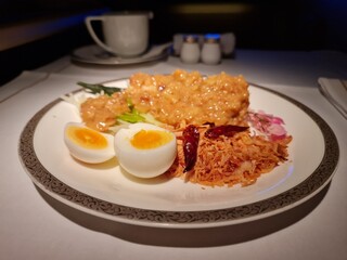 Thai style noodle with boiled eeg in name Khanomjeen namprik