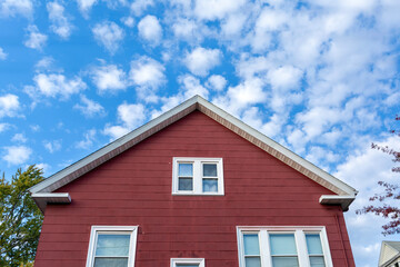 Traditional architecture of a red house with gable roof in Brighton, Massachusetts, USA
d image
