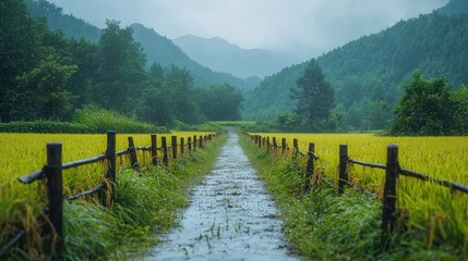 Fototapeta premium Serene Path Through Lush Greenery and Misty Mountains