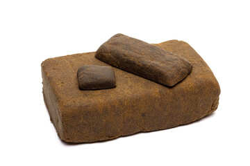 Blocks of hashish isolated on white background