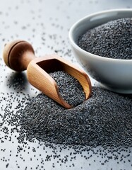Close-up of poppy seeds in a wooden scoop and bowl. Dark grey tones and rustic feel.