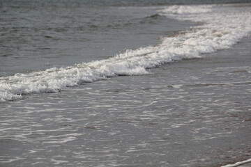 Image of waves crashing at Dadaepo Beach in Busan
