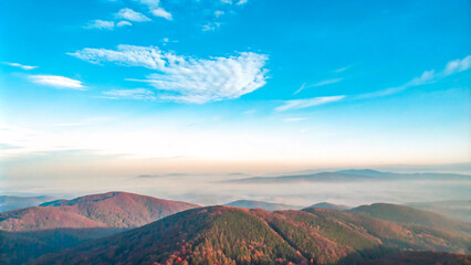 Fototapeta premium Mountain sunset landscape with clouds and greenery