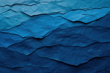 Fototapeta premium Textured layers of deep blue and turquoise paper create serene oceanic feel. varying shades evoke calmness and depth