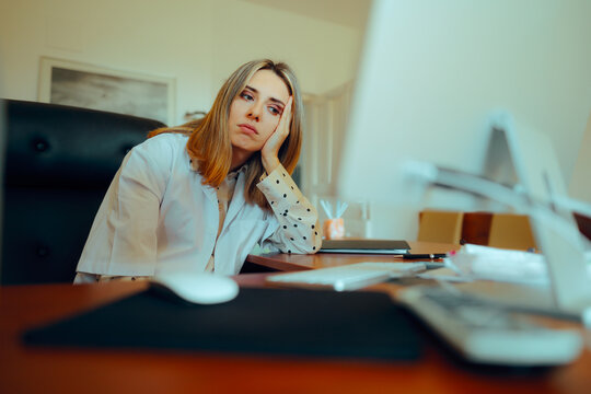 Sad Tired Doctor Feeling Apathetic and Distraught. Medical personnel having trouble at work suffering from a migraine  
