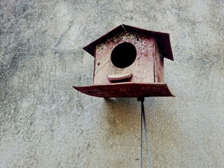 bird house on a wall 