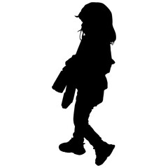 A silhouette of a little girl walking