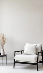 Cozy minimalist chair with cushions and decorative vase in bright interior setting against light wall