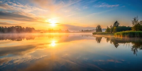 Obraz premium Misty sunrise over calm lake, misty, sunrise, calm, lake, tranquil, reflection, nature, serene, peaceful, water, morning