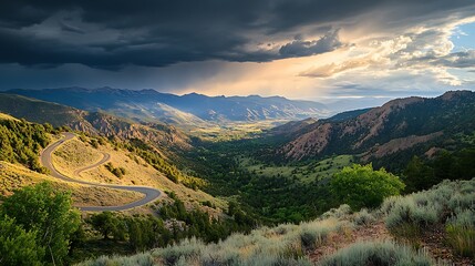 Mountain Road Winding Through Dramatic Valley Landscape