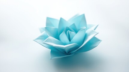 A delicate blue origami lotus flower on a soft background, symbolizing tranquility and beauty.