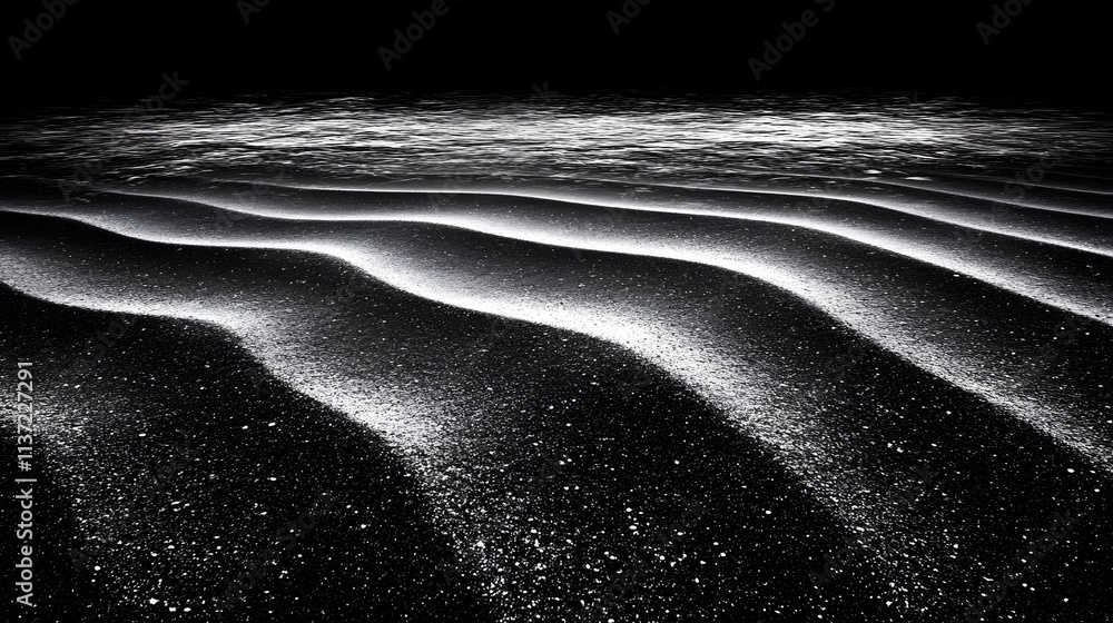 Poster a serene black and white image of gently rolling sand dunes, showcasing contrasting light and shadow
