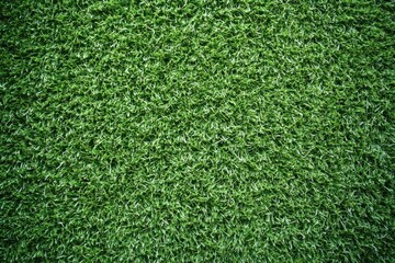 Obraz premium A close-up view of a lush green artificial grass surface