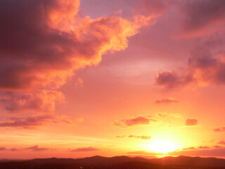Colourful sky at sunset with pink and purple clouds