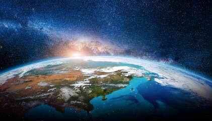 planeta con un cielo azul y la Tierra