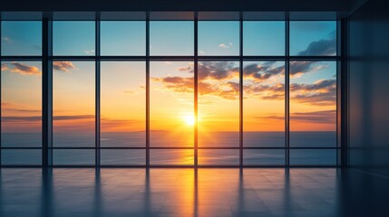 Fototapeta premium A stunning sunset view through large glass windows, illuminating a serene coastal landscape.