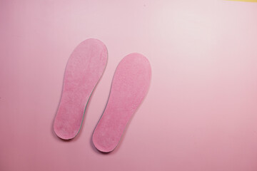 Soft Pink Insoles Set Against a Beautiful Pastel Background Aesthetic