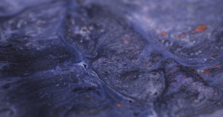 Liquid glitter texture. Blur blend. Defocused multicolor purple shimmering gleaming flow marble...