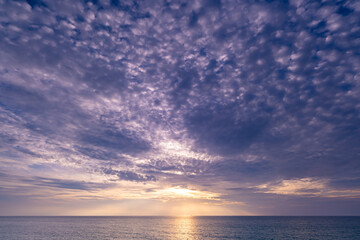 Beautiful clouds in sunset or sunrise over sea,Colorful scenery sunset sky, Amazing clouds wonderful light sky background