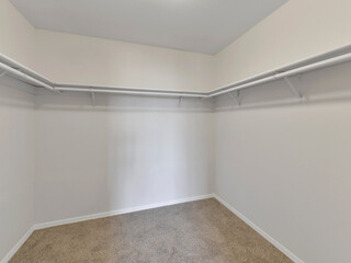 Fototapeta premium Modern residential empty bedroom closet interior