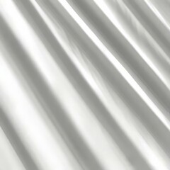 Obraz premium Soft light rays streaming across a smooth white surface, creating a serene and abstract background perfect for design, presentations, or creative projects