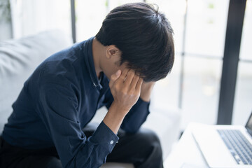 man tiredness and stress while having headache. Painful men are stressed