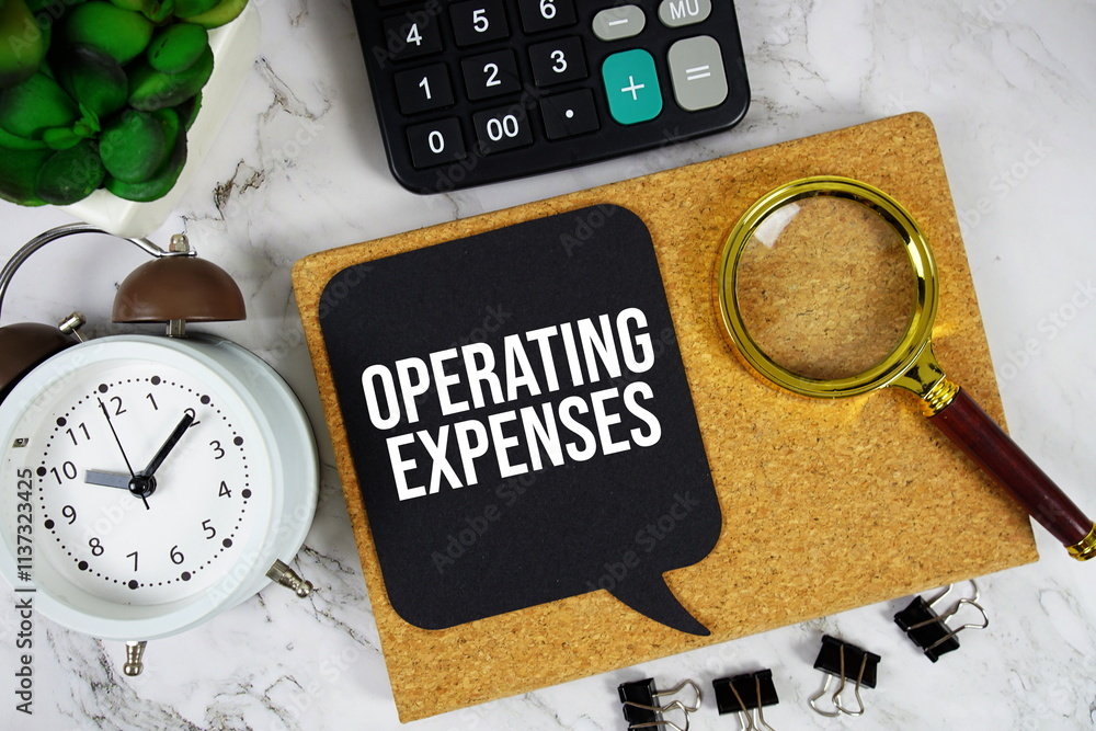 Poster operating expenses text on speech bubble with alarm clock, calculator and magnifying glass on marble